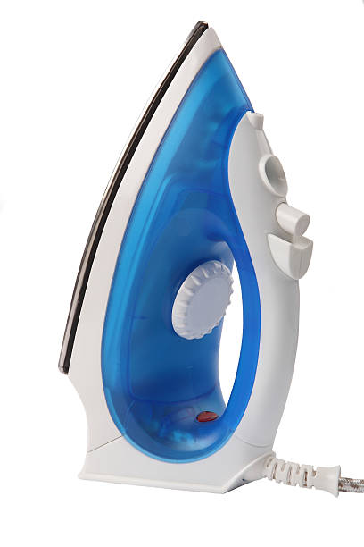 istock Steam iron isolated on white background 529784011