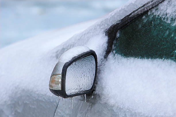 istock car covered with ice and snow 529784765