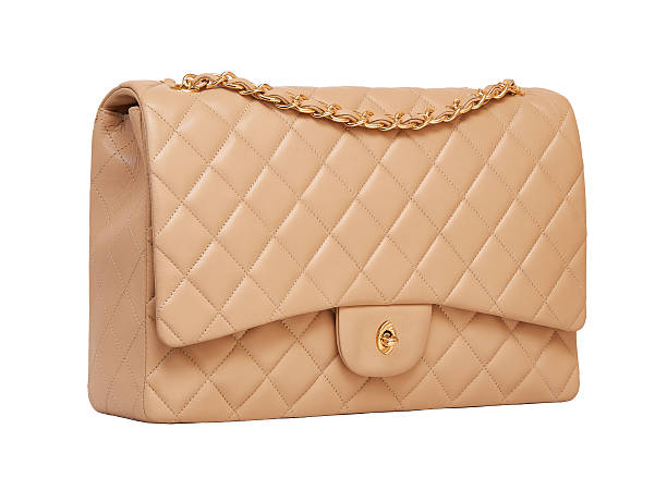 istock Women's beige leather handbag 529784779