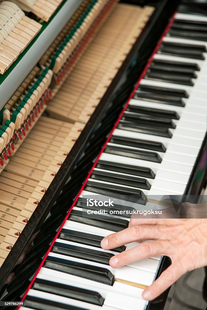 Piano Chord The inside of the piano and make chord. Accessibility Stock Photo