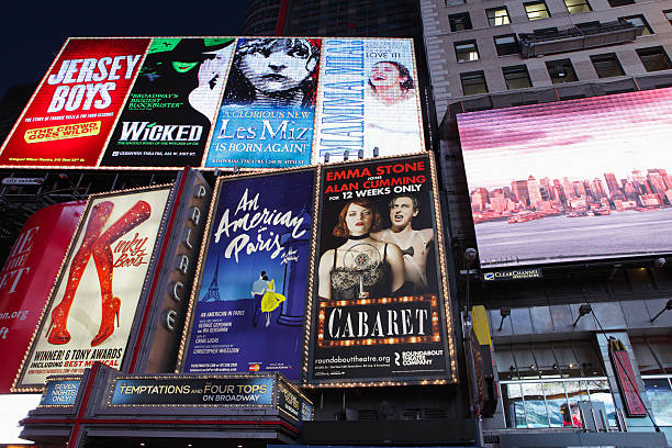 Electric billboards in Times Square New York advertising theatre stock photo