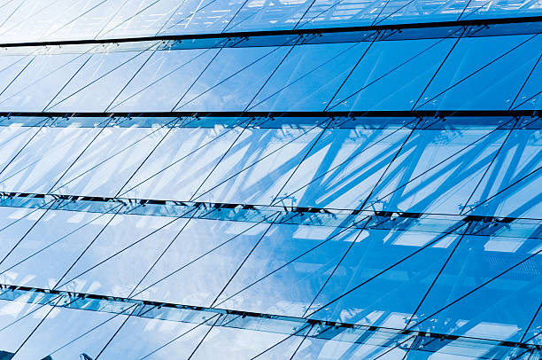 istock Blue glass architecture on modern office building with steel construction 529786591