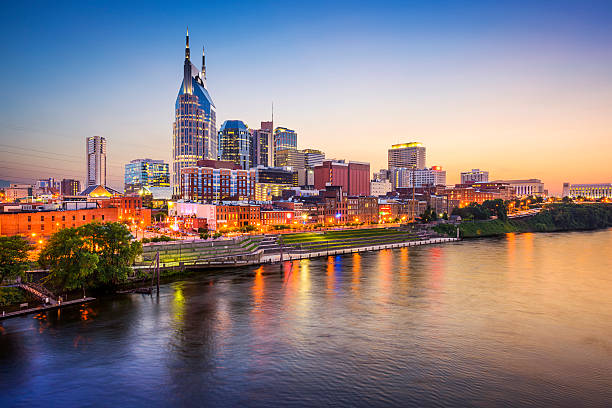 Nashville, Tennessee, USA Nashville, Tennessee, USA downtown skyline on the Cumberland River. tennessee stock pictures, royalty-free photos & images