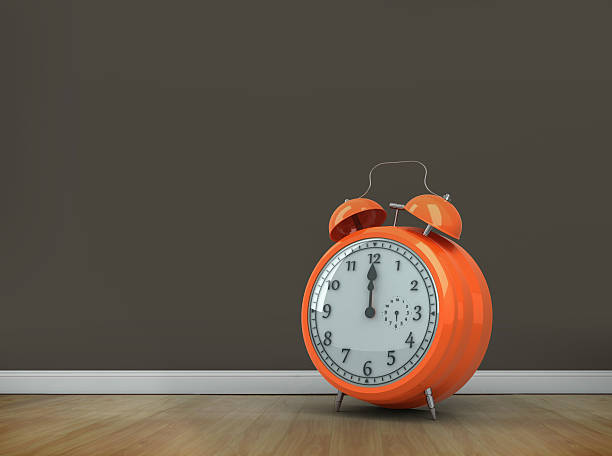 istock Composite image of alarm clock counting down to twelve 529787169