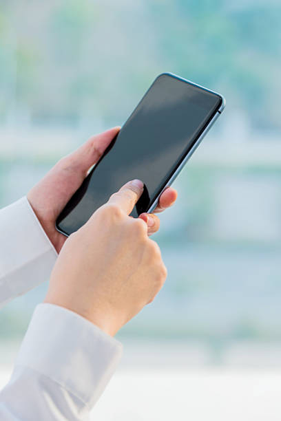 istock Businesswoman using smart phone 529787823