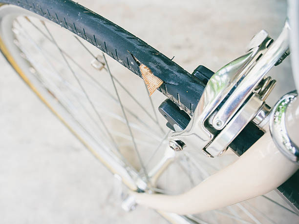 istock Punctured bicycle tire inner tube. 529787961