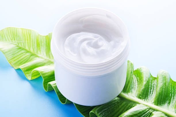 istock Cosmetic cream on top of the leaf 529799977