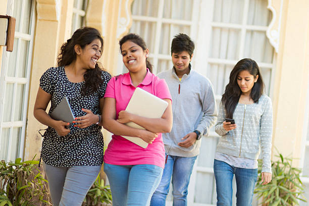 istock Young Indian female Students hanging out on School Grounds 529801189