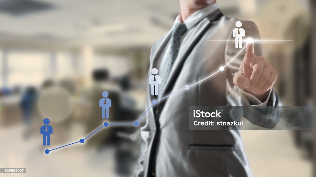 Businessman working with digital visual object, human resource c Businessman working with digital visual object, human resource concept Adult Stock Photo