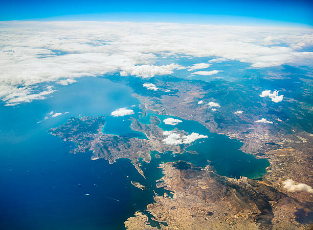 Aerial view on Greek coast with Athens, Salami island, airport, harbor and numerous ships,