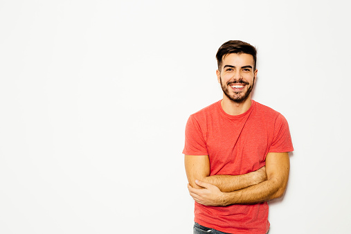 Young man in front of  white background