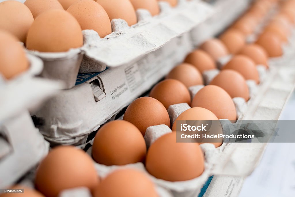 Brown Eggs Crates of eggs at farmers market. Animal Egg Stock Photo