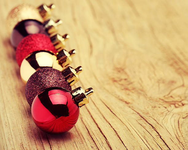istock Christmas Balls Over Wooden Background 529835231