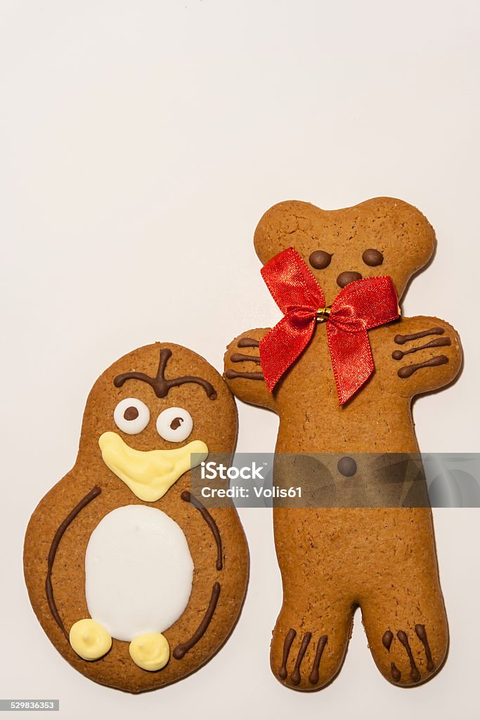 Gingerbread Cookies Isolated on white. Gingerbread Pinguin And Gingerbread  Bear Isolated on white. Baked Stock Photo