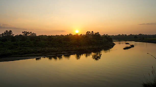 istock Sunset Over the East Rapti River in Nepal 529837415