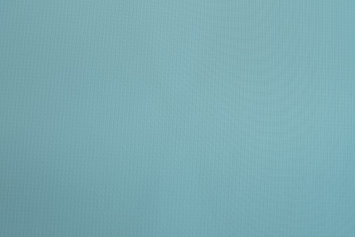 the abstract textured display background from pixels of turquoise color