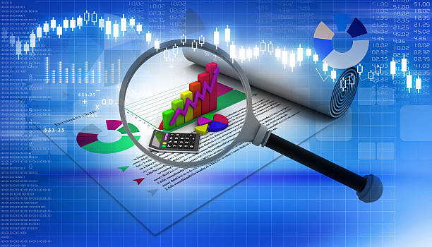 istock business report with magnifying glass 529838947