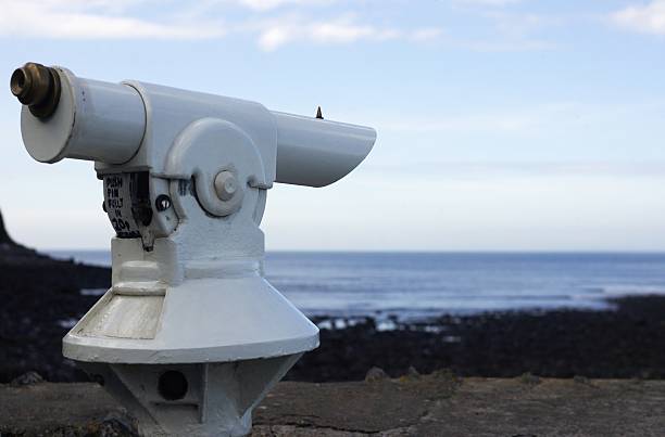 istock coin operated telescope at a beach 529839819