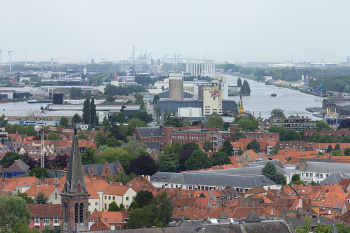 Bruges, Belgium - June 14, 2013: Houses of Bruges view from the tower of the famous Belfort (bell tower).