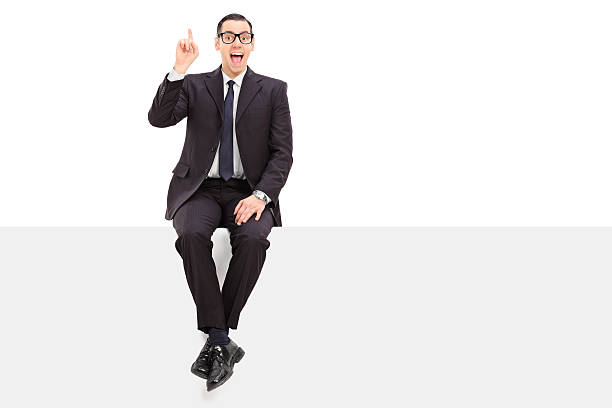 istock Young businessman has an idea seated on a panel 529869239