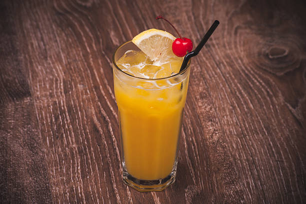 istock cocktail in high glass with straw 529871293