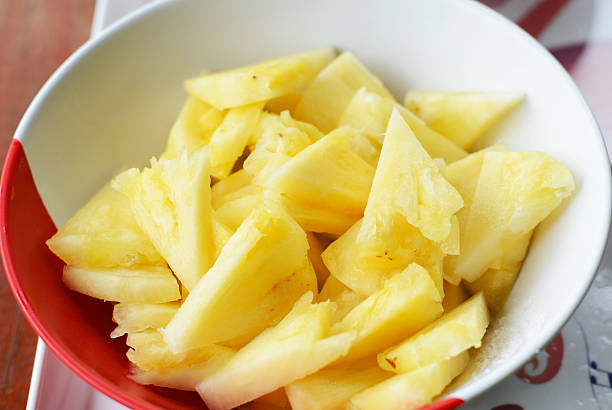 Pineapple fruit to eat with close up stock photo