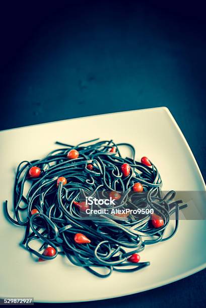 Pasta With Wheat Germ And Black Cuttlefish Ink Stock Photo - Download Image Now - Backgrounds, Black Color, Carbohydrate - Food Type