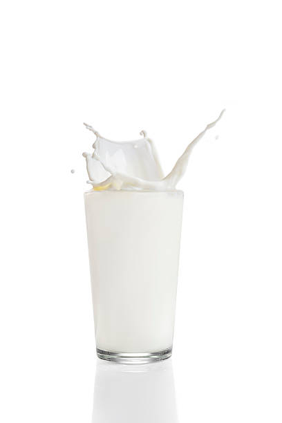 istock Splashing milk in drinking glass 529876407