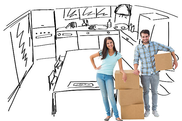 istock Composite image of attractive young couple with moving boxes 529899125