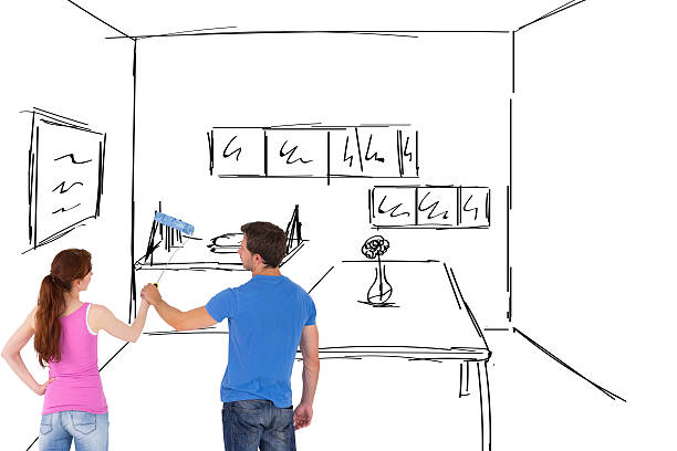 istock Composite image of couple painting a wall together 529899189