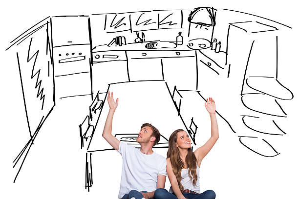 istock Composite image of happy young couple with hands raised 529899265