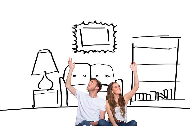 istock Composite image of happy young couple with hands raised 529899275
