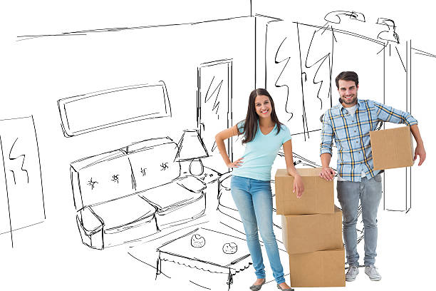 istock Composite image of attractive young couple with moving boxes 529899385