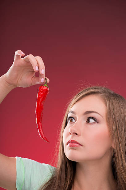 istock Beautiful girl on red background 529899835
