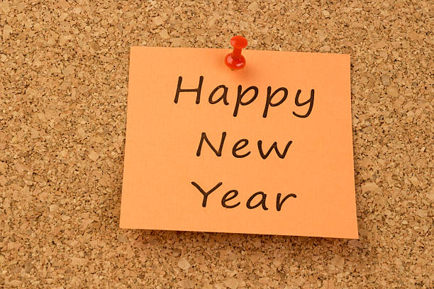 istock Happy New Year on an orange sticky note 529900077