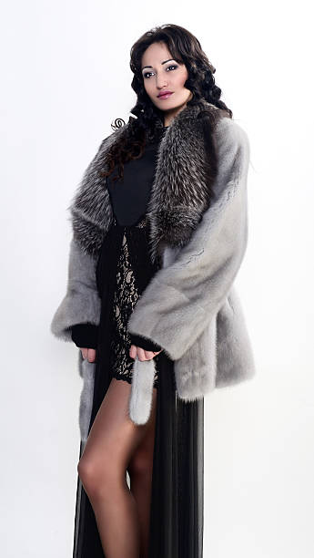 istock Female model in fur is standing 529917117