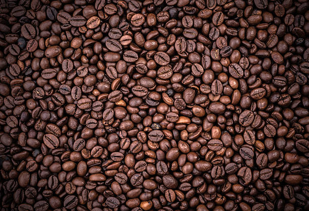 espresso-bohnen - bean macro brown roasted stock-fotos und bilder