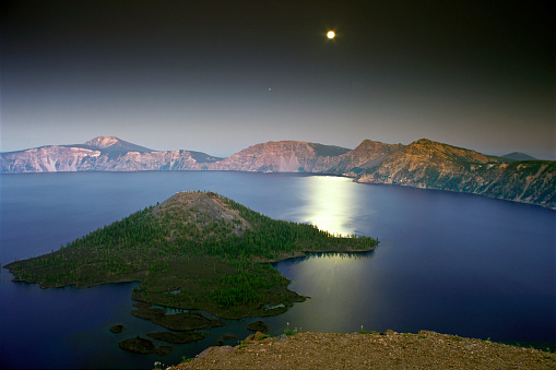 Full moon over the East Rim of Crater Lake National Park, Oregon.