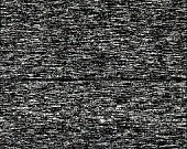 Noise on a black screen background