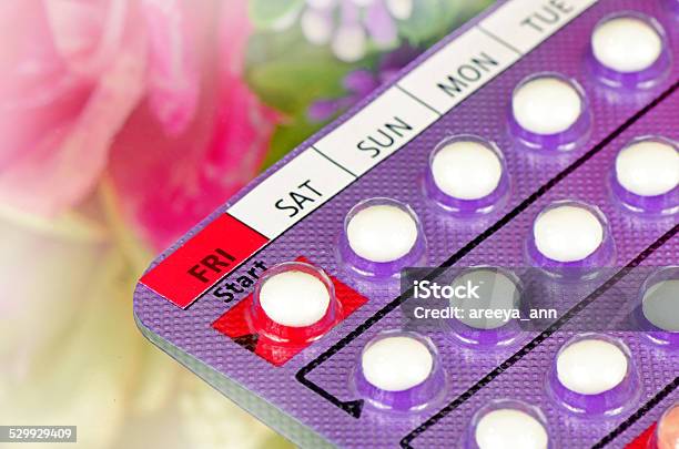 Contraceptive Pills With Soft Floral Background Stock Photo - Download Image Now - Acne, Adult, Bicycle