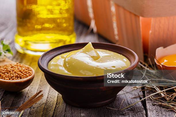 Homemade Mayonnaise Into A Bowl On A Wooden Surface Stock Photo - Download Image Now