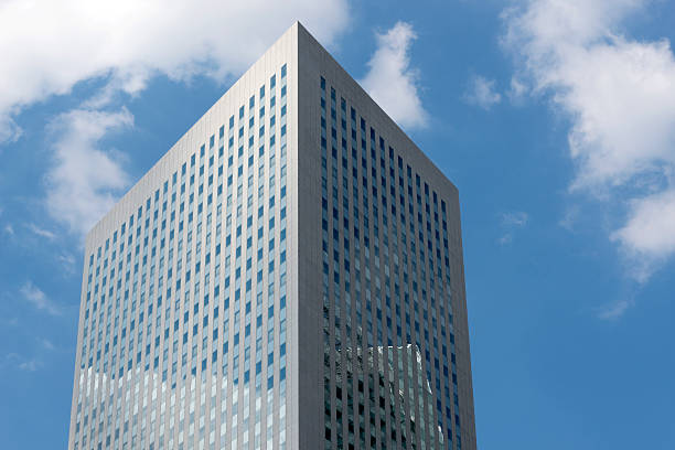 istock Skyscrapers from ground view with blue sky visible 529946375