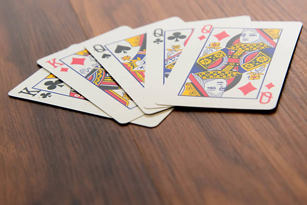 istock playing cards - full house with queens and kings 529946719