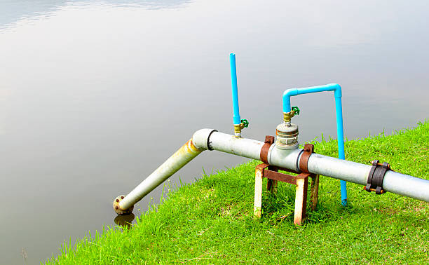 istock old water suction pipe in the pool, for water supply 529946935