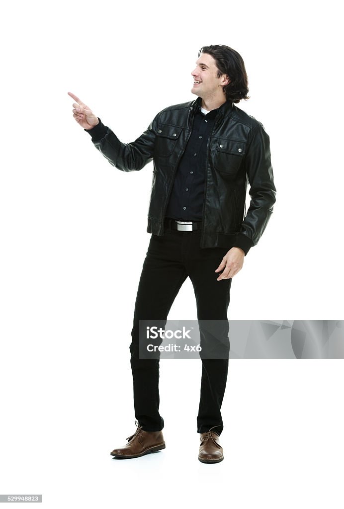 Smiling man pointing away Smiling man pointing awayhttp://www.twodozendesign.info/i/1.png 20-29 Years Stock Photo