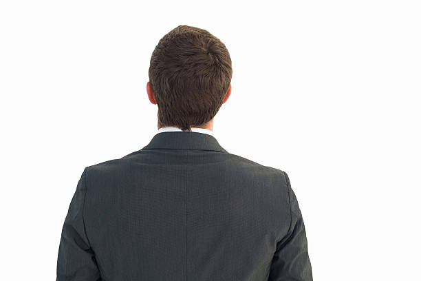 istock Businessman looking up in suit 529949735