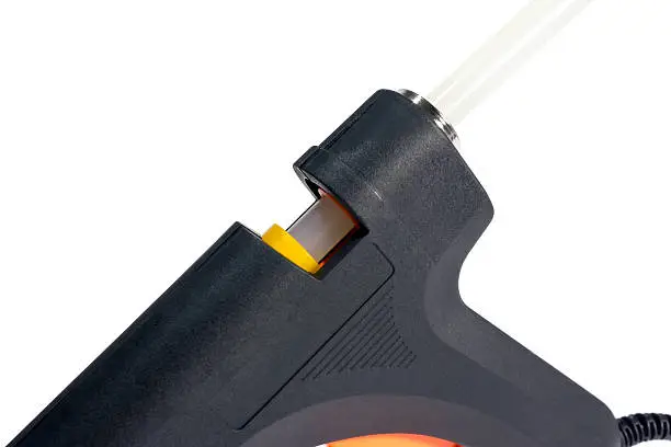 Electric hot glue gun isolated on a white background.