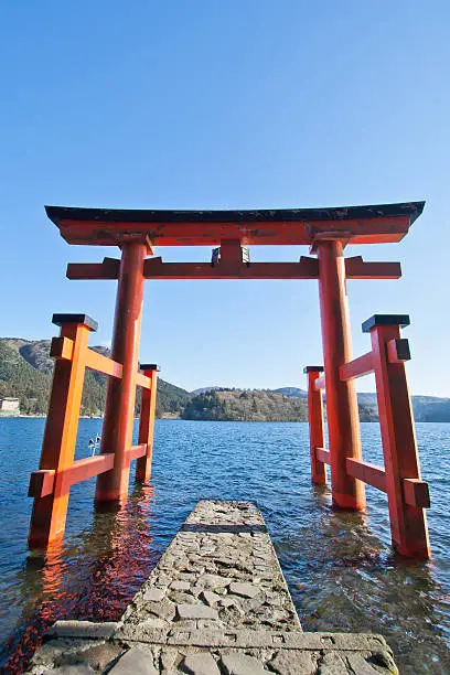 The torii gate which stand on the shore of Lake Ashi, near Mount Fuji in Japan.