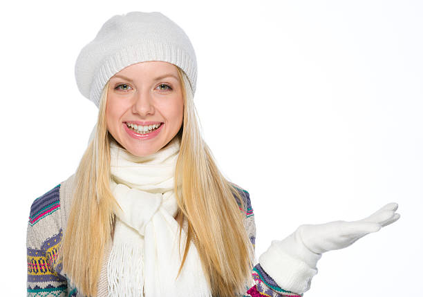 young woman enjoys cold winter day at public park