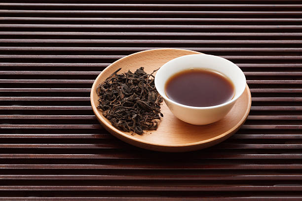 Aged Pu'er tea Aged Pu'er tea，China's famous high-quality tea bakelite stock pictures, royalty-free photos & images